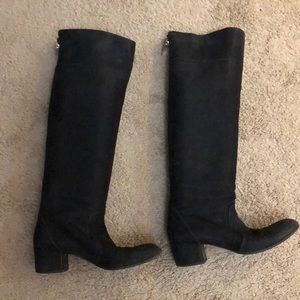Black knee high Chanel boots